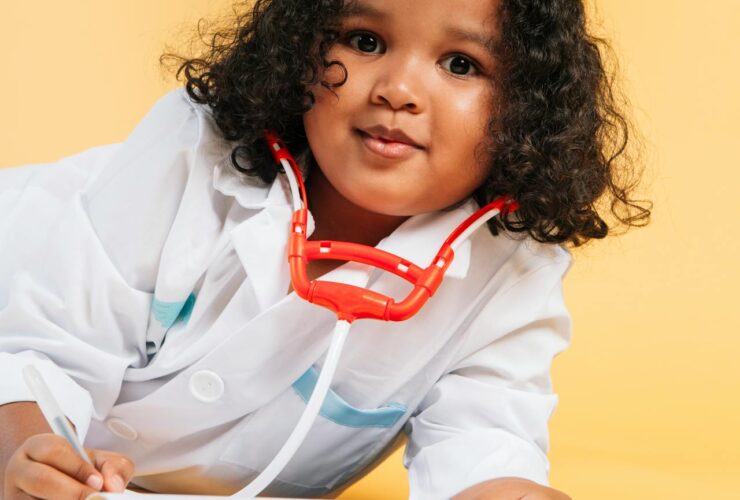 child dressed as a doctor