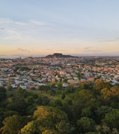 Aerial view of the cityscape of San Fernando against the dusk sky at sunset in Trinidad and Tobago