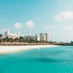 Aruba showing beach and hotel in backdrop