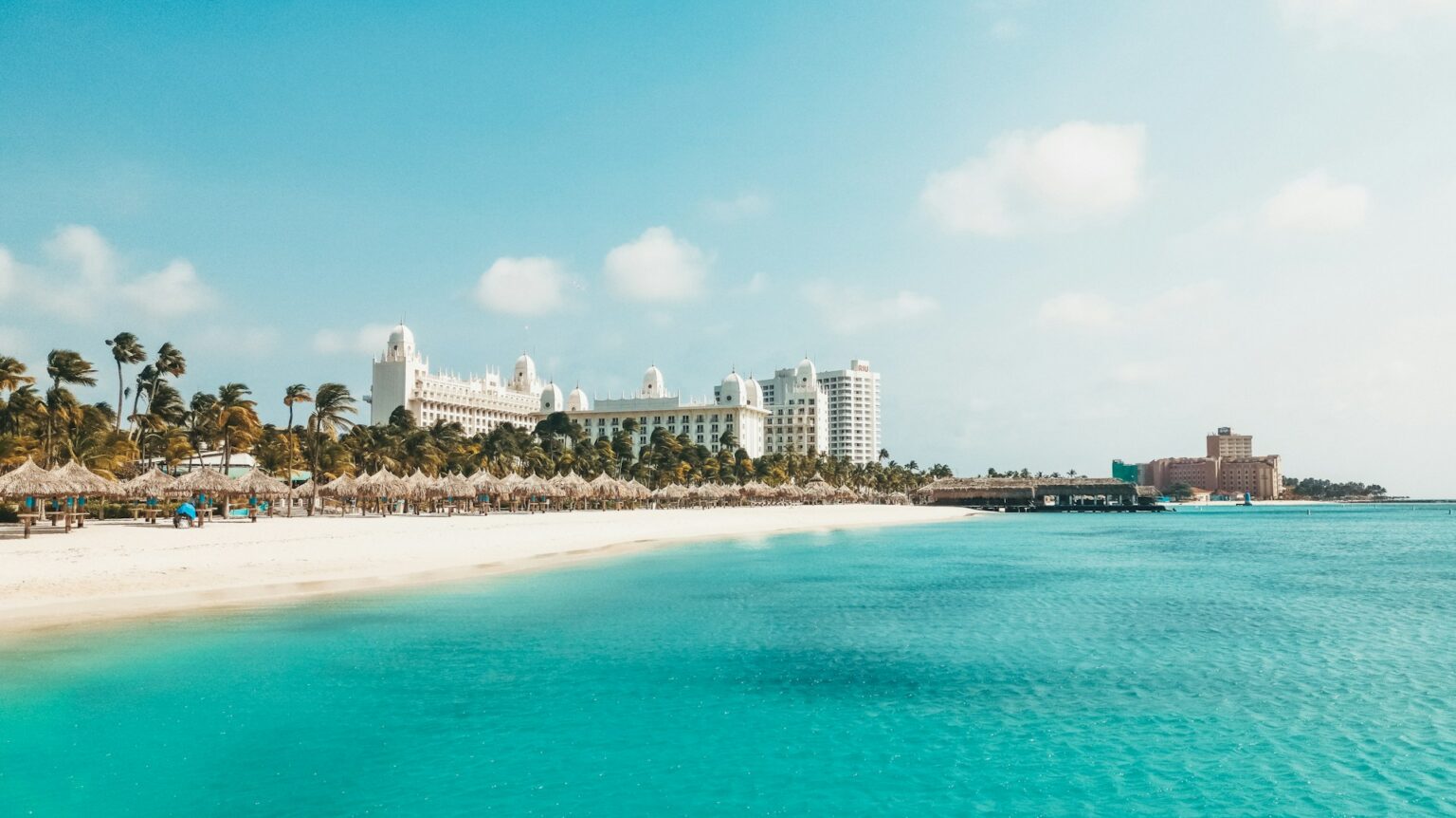 Aruba showing beach and hotel in backdrop