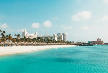 Aruba showing beach and hotel in backdrop