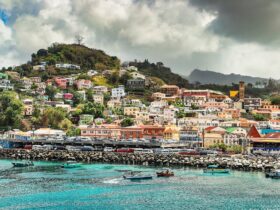 Grenada with boats on the sea and colourful houses in the background