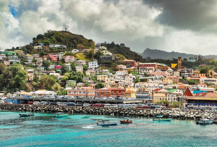 Grenada with boats on the sea and colourful houses in the background